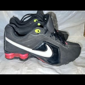 Nike youth sneaker size 4 black, pink, white.